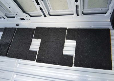 AutoPly insulation kit floor installation in Mercedes-Benz Sprinter 170 cargo van showing precision-cut sound deadening panels