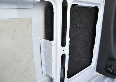 AutoPly insulation kit floor installation in Mercedes-Benz Sprinter 170 cargo van showing precision-cut sound deadening panels