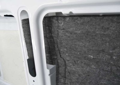 AutoPly insulation kit floor installation in Mercedes-Benz Sprinter 170 cargo van showing precision-cut sound deadening panels