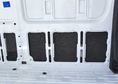 AutoPly insulation kit floor installation in Mercedes-Benz Sprinter 170 cargo van showing precision-cut sound deadening panels