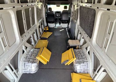 AutoPly insulation kit floor installation in Mercedes-Benz Sprinter 170 cargo van showing precision-cut sound deadening panels