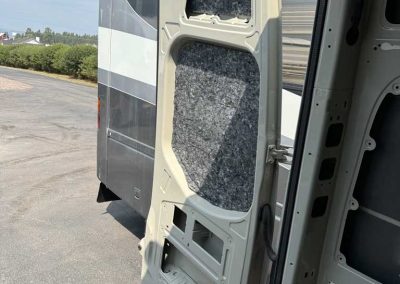 AutoPly insulation kit floor installation in Mercedes-Benz Sprinter 170 cargo van showing precision-cut sound deadening panels